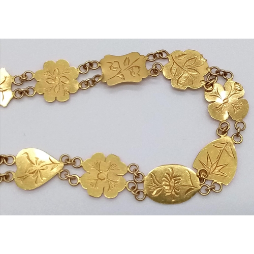 408 - A 10K Yellow Gold Thin Floral Link Necklace. 40cm.
12.8g. Ref - 8695.