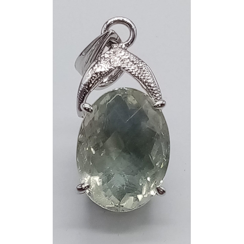 789 - A sterling silver pendant with a large oval cut green amethyst. Dimensions: 31 x 14 x 11 mm, weight:... 