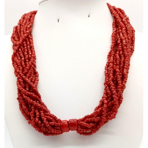 984 - A Vintage Fifteen-Row Coral Beaded Necklace. 42cm.