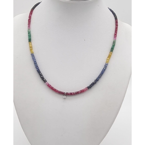 234 - A Multi-Coloured Ruby, Sapphire and Emerald Necklace with a Diamond Hanging From The Centre - set in... 