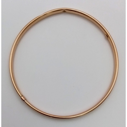 342 - A 9K Yellow Gold Italian Bangle. Slight kink damage so a/f. 3.5g. 6.5cm inner diameter.