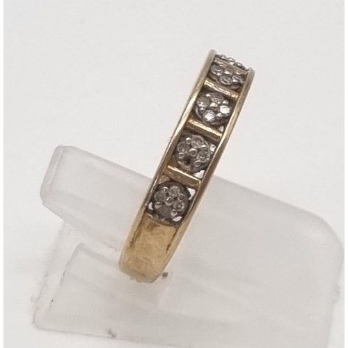 388 - A 9K Yellow Gold Diamond Half-Eternity Ring. Six x four squares of small diamonds. Size L. 1.92g tot... 