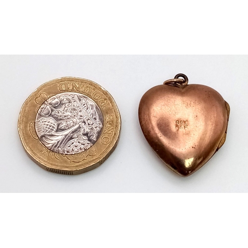 618 - A Vintage 9K Yellow Gold Back and Front Heart Locket Pendant. 3.41g total weight.