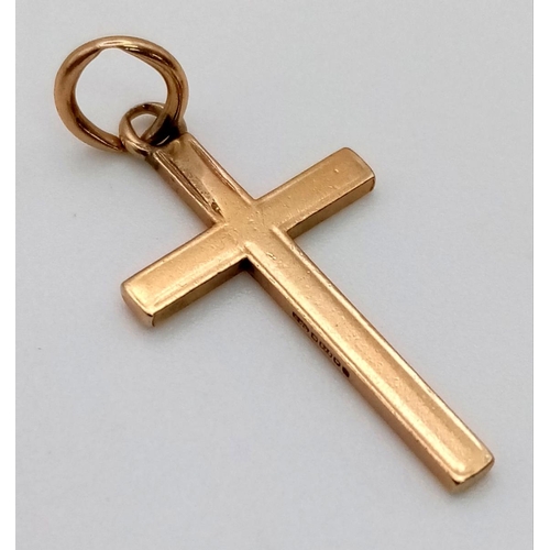 666 - A 9K Yellow Gold Cross Pendant. 15 x 25mm. 1.36g.