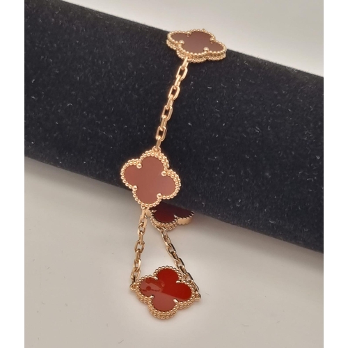 75 - An 18K Rose Gold Van Cleef and Arpels Alhambra Bracelet. Faithful to the very first Alhambra jewel c... 