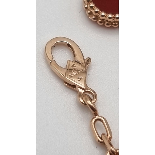 75 - An 18K Rose Gold Van Cleef and Arpels Alhambra Bracelet. Faithful to the very first Alhambra jewel c... 