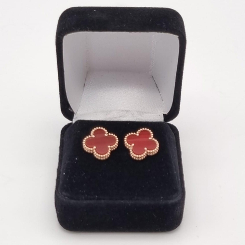 8 - A Pair of 18K Rose Gold Van Cleef and Arpels Alhambra Carnelian Stud Earrings. Light and delicate th... 