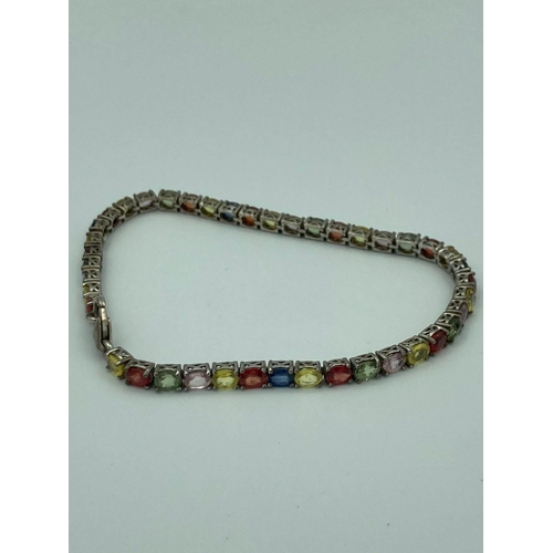 127 - Fabulous SILVER TENNIS BRACELET Set with large selection of coloured gemstones to include TOPAZ ,SAP... 