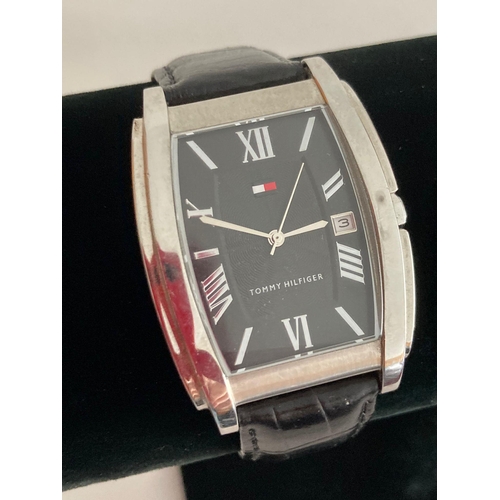 64 - Gentlemans Quartz TOMMY HILFIGER wristwatch,Square black face model finished in silver tone with sil... 