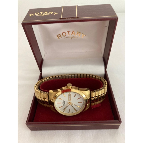 78 - Gentlemans Quartz ROTARY WRISTWATCH in gold tone. Day/Date model,having white face with golden digit... 