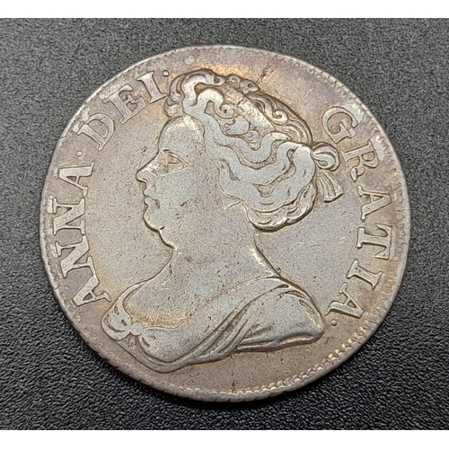 262 - A 1711c Queen Anne Shilling Silver Coin. 3rd bust. VF condition. Spink - 3610. Please see photos.