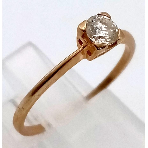 375 - An 18K Yellow Gold Diamond Solitaire Ring. 0.2ct.
Size N. 1.17g total weight.