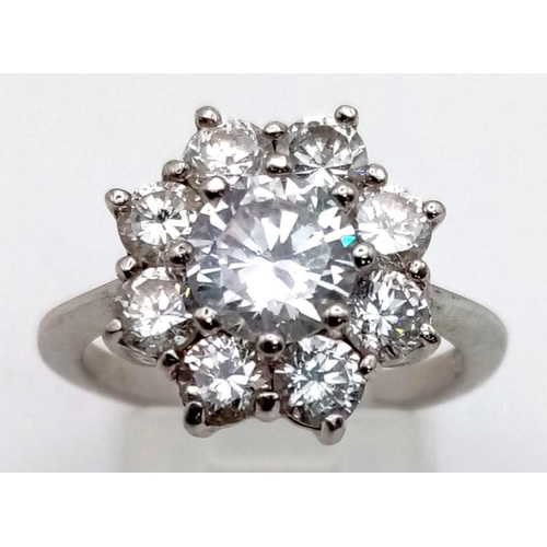 423 - A 925 Silver CZ Decorative Flower Ring. Size M.