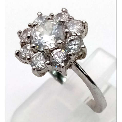 423 - A 925 Silver CZ Decorative Flower Ring. Size M.