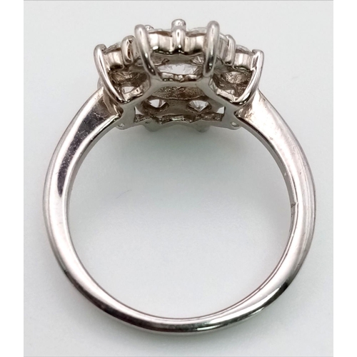 423 - A 925 Silver CZ Decorative Flower Ring. Size M.