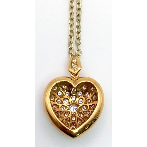 60 - An 18K Yellow Gold Heart-Shaped Diamond Pendant. With over 1ct of bright white diamonds this sturdil... 