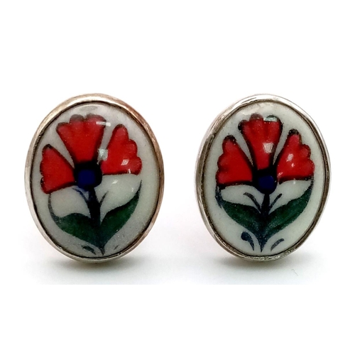 795 - A Vintage Pair of Silver and Enamel Cufflinks.