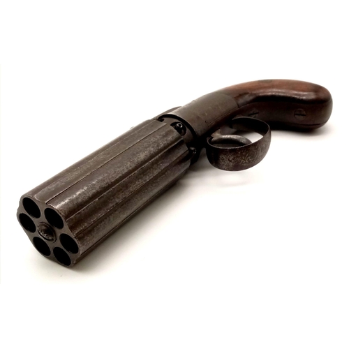 40 - A Rare Mid 1800s Pepper Pot Percussion Pistol. Six revolving barrels. Top bar hammer. Made by Edward... 