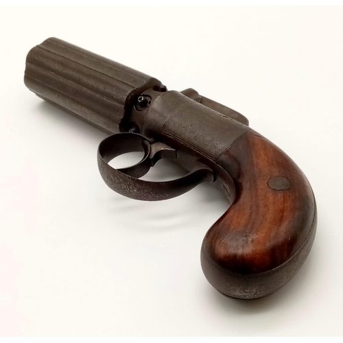 40 - A Rare Mid 1800s Pepper Pot Percussion Pistol. Six revolving barrels. Top bar hammer. Made by Edward... 