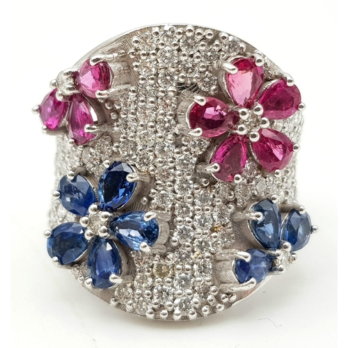 535 - 18K Gold, Sapphire, Ruby and Diamond (1.5ct) Ring. An additional 5ct of floral designed ruby and sap... 