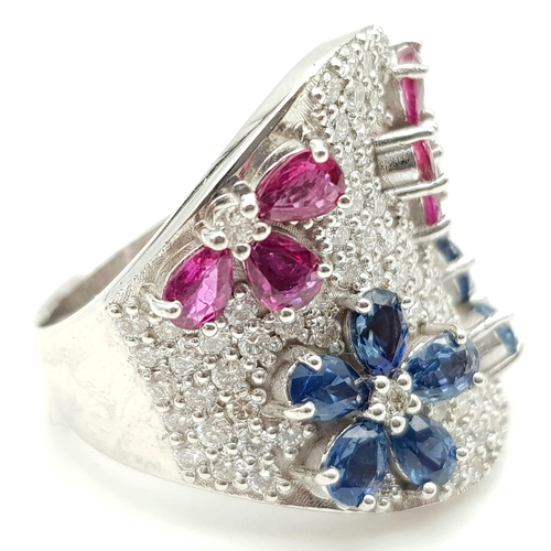 535 - 18K Gold, Sapphire, Ruby and Diamond (1.5ct) Ring. An additional 5ct of floral designed ruby and sap... 