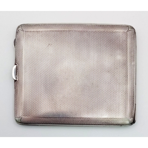 787 - A 1932 Silver Cigarette Case. Machine engraved with gilded interior. Hallmarks for Birmingham. 8 x 1... 