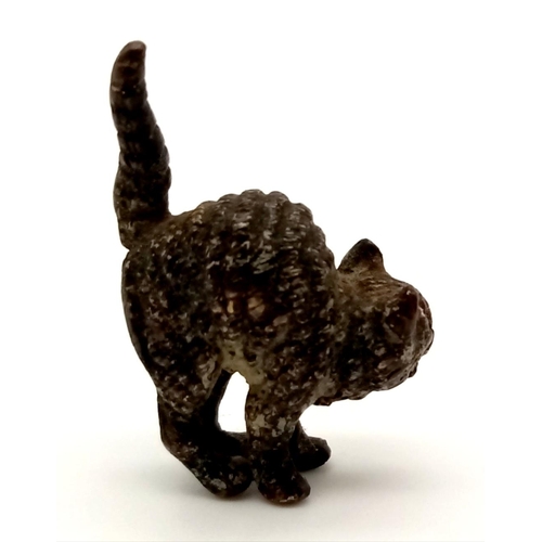 414 - An Antique Bergman Cold-Painted Bronze in the Form of a Cat. 3 x 3cm.