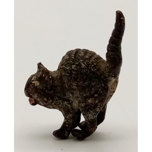 414 - An Antique Bergman Cold-Painted Bronze in the Form of a Cat. 3 x 3cm.