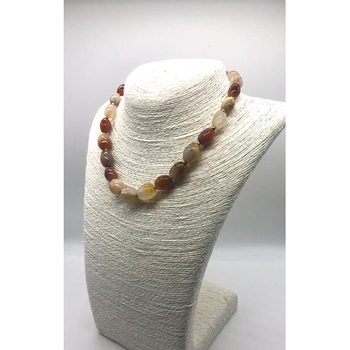 194 - A Beautifully Graduated Highly Polished Multi-Coloured Agate Bead Choker Necklace. 40cm. 13-15mm bea... 