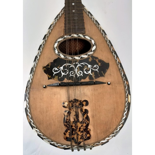 276 - A Antique 1890s Roundback Mandolin. Marks for: Michele Maretea - W. Trengove of Whittlesea. In need ... 