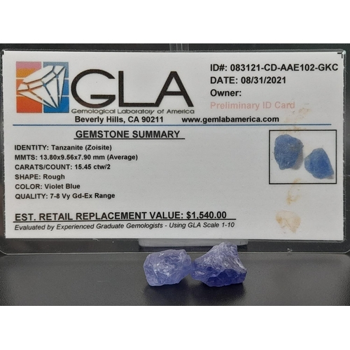 328 - Two rough tanzanite pieces (total 15.45 carats) with GLA certificate. Average dimensions: 13.80 x 9.... 