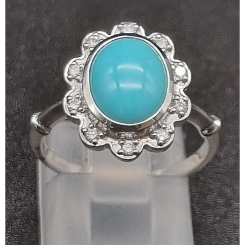 367 - 18K Natural turquoise and diamond set.
Ring: 5.36g, size M
Earrings: 9.00 grams total, length: 2.3cm... 