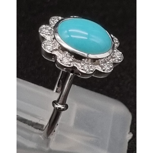 367 - 18K Natural turquoise and diamond set.
Ring: 5.36g, size M
Earrings: 9.00 grams total, length: 2.3cm... 