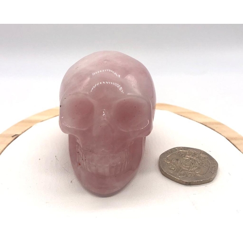 478 - A Rose Quartz Skull Figure. 4 x 5cm.