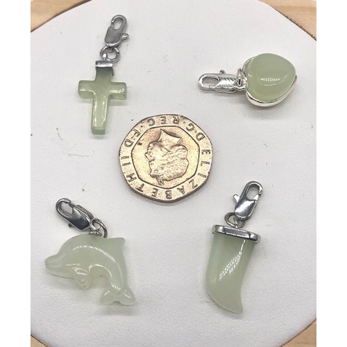 481 - Four Miniature Jade Figure Pendants - Heart, Bear claw, cross and a Dolphin.