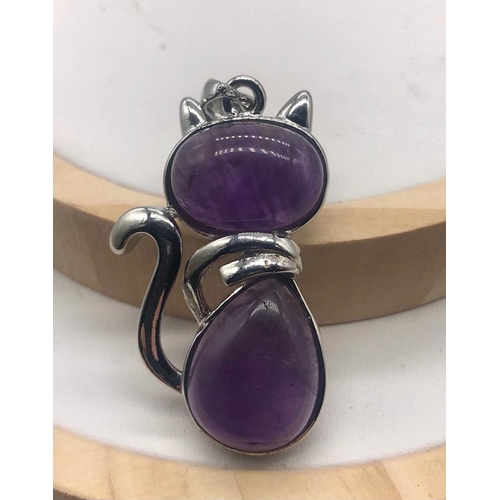 488 - Two Gemstone Cat Pendants - Rose quartz and amethyst
4.5cm