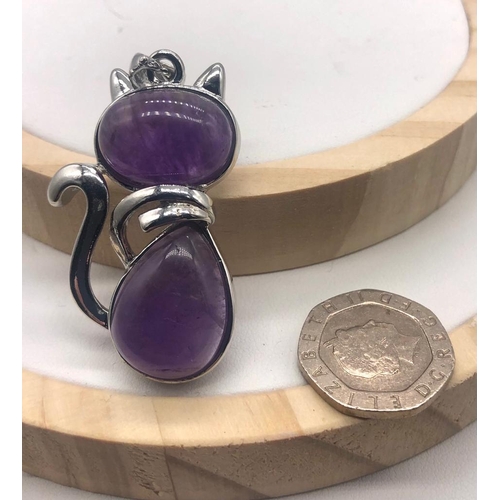 488 - Two Gemstone Cat Pendants - Rose quartz and amethyst
4.5cm