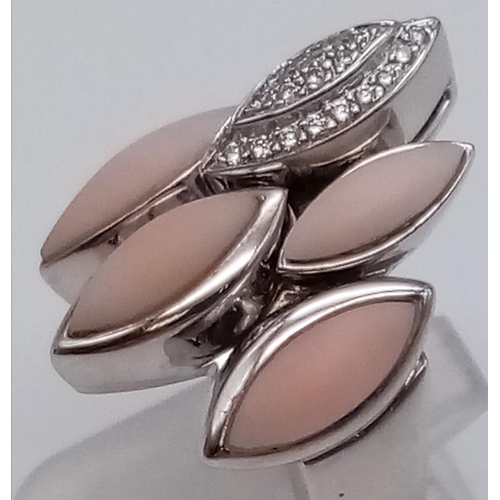 572 - An 18K White Gold Pearl and Diamonds Five-Oval Ring. Size N. 14.56g total weight.