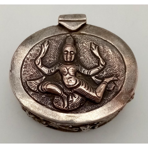 391 - An Antique Burmese Solid Silver Snuff or Pill Box. Wonderful embossing decoration throughout. Good c... 