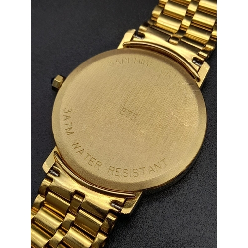 12 - A 21K yellow gold GENIVE gents watch . 33 mm dial with white and black face, gold hands and Roman nu... 