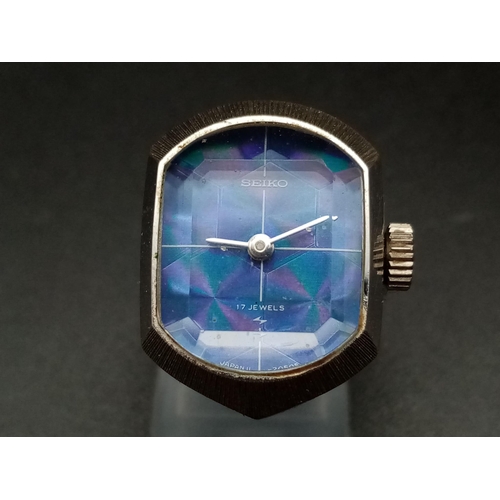 291 - A Rare Seiko Ring Watch. Blue dial. Mechanical movement. 20 x 15mm. In working order but no guarante... 