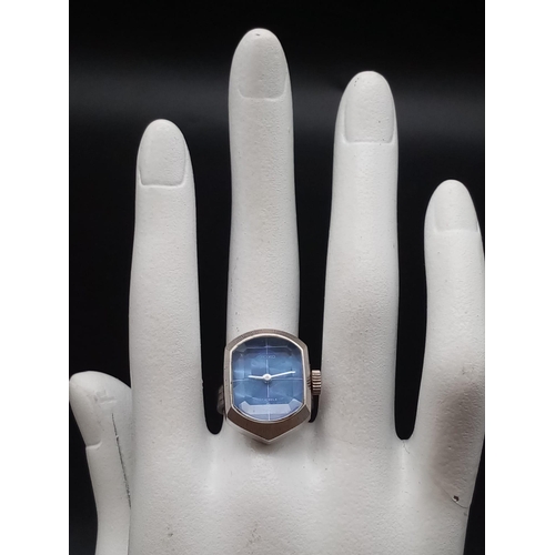 291 - A Rare Seiko Ring Watch. Blue dial. Mechanical movement. 20 x 15mm. In working order but no guarante... 