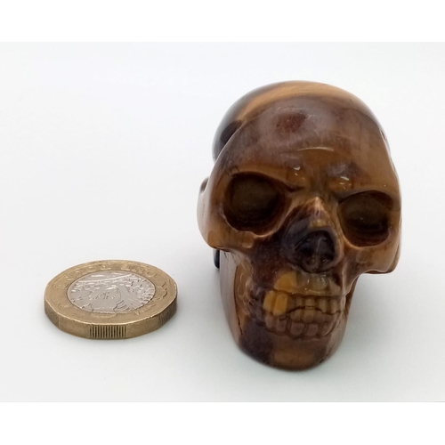 90 - A Hand-Carved Tigers Eye Crystal Skull Figure. Perfect as an ornament or small paperweight. 5 x 4cm