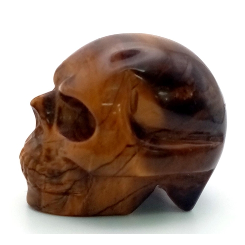 90 - A Hand-Carved Tigers Eye Crystal Skull Figure. Perfect as an ornament or small paperweight. 5 x 4cm