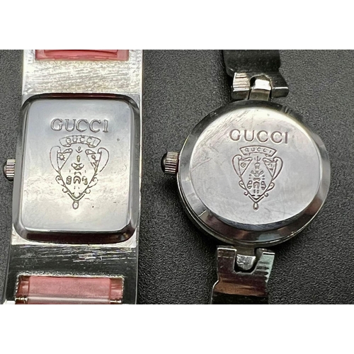 506 - 2 ladies Gucci quartz watches in good condition and working order consisting of:
Stainless steel bla... 