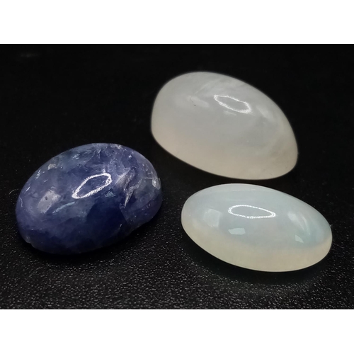 655 - Lot of 3 Gemstones - 2.47 Ct Cabochon White Fire Opal, 7.75 Ct Cabochon Tanzanite & 8.75 Ct Cabochon... 