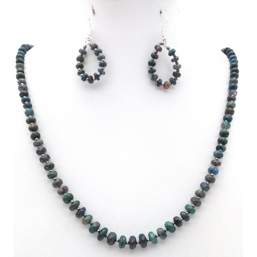 139 - A high quality Australian, multifaceted, black opal necklace and earrings set. Necklace length: 57 c... 