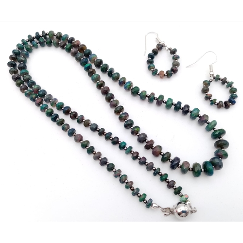 139 - A high quality Australian, multifaceted, black opal necklace and earrings set. Necklace length: 57 c... 