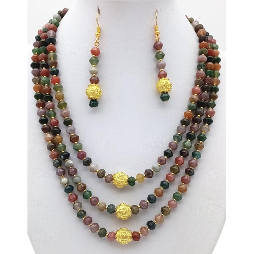 181 - A three strand, multicoloured, Malaysian jade necklace and earrings set with Chinese gilded accents.... 