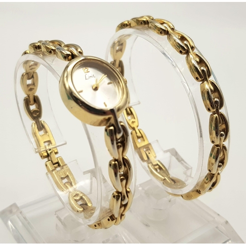 344 - A Limit Gold Plated Ladies Quartz Watch with Spare Bracelet. As new, unused in original case. In ful... 